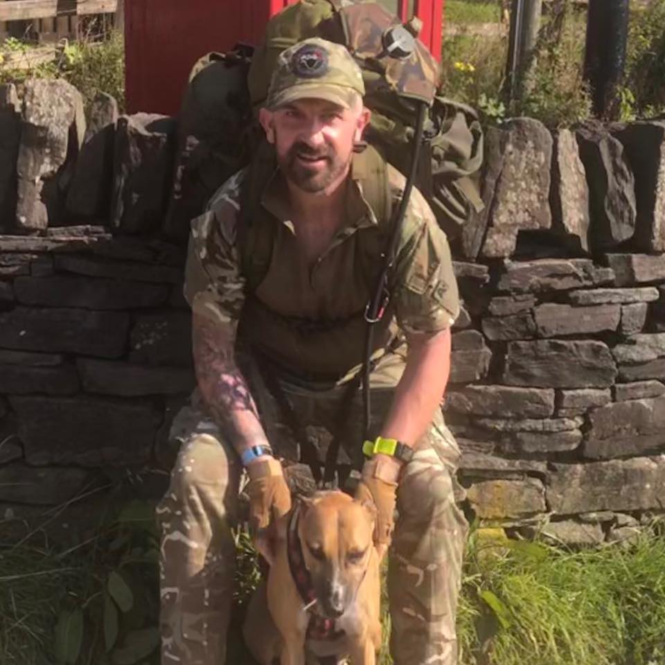 Steve O'Connor in the field with his dog